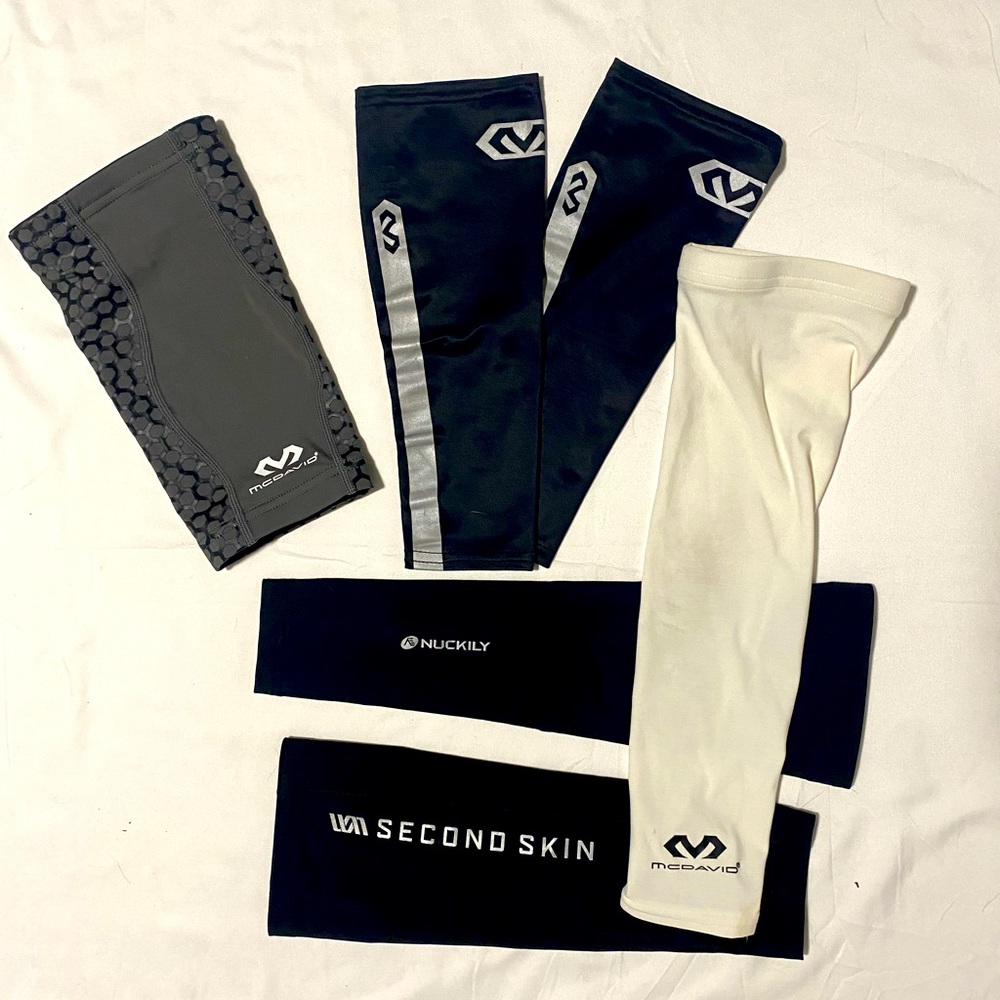 Arm sleeves and knee sleeve, one pair with 4 singles